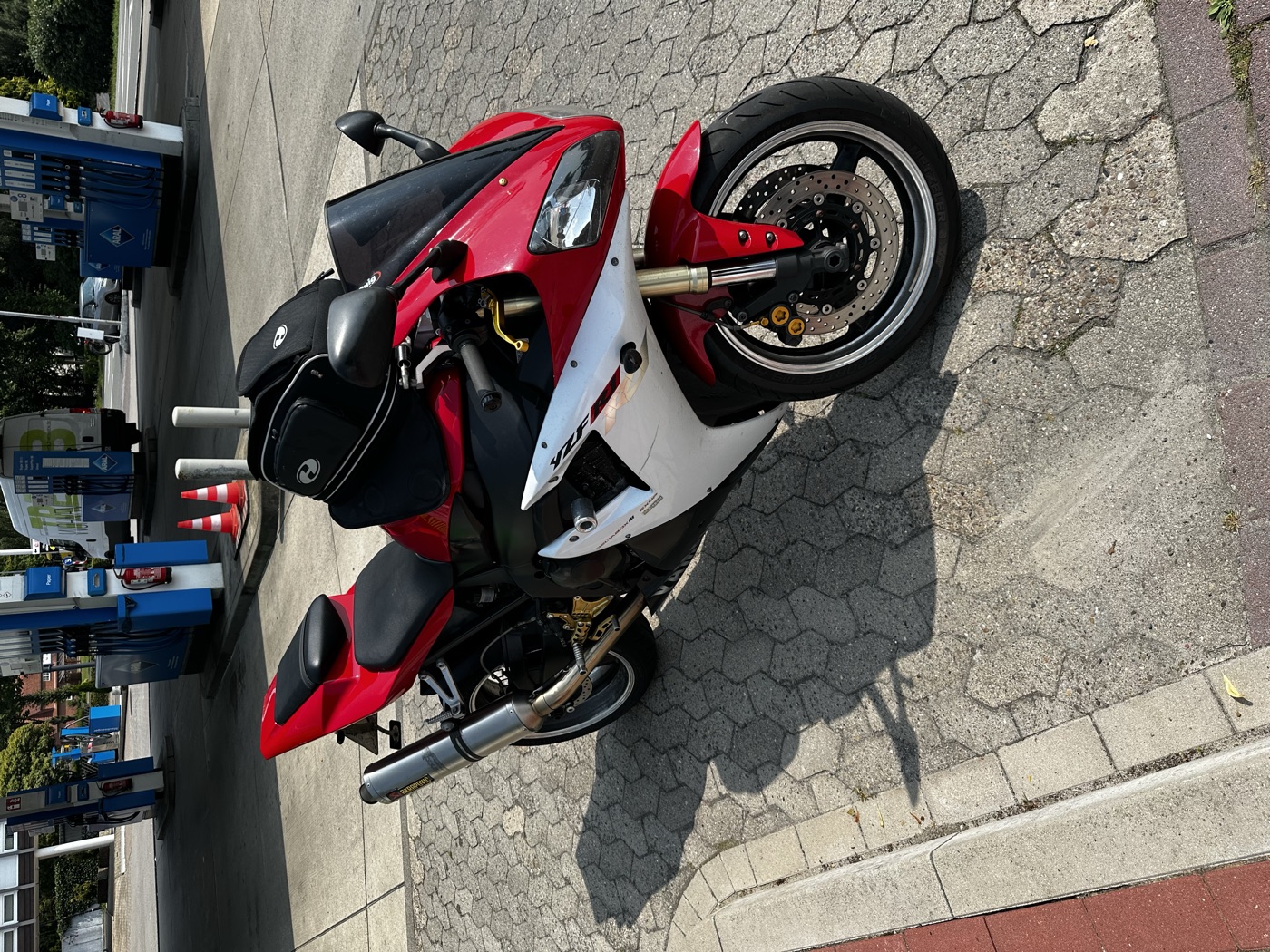 Mario's red and white motorcycle during a ride